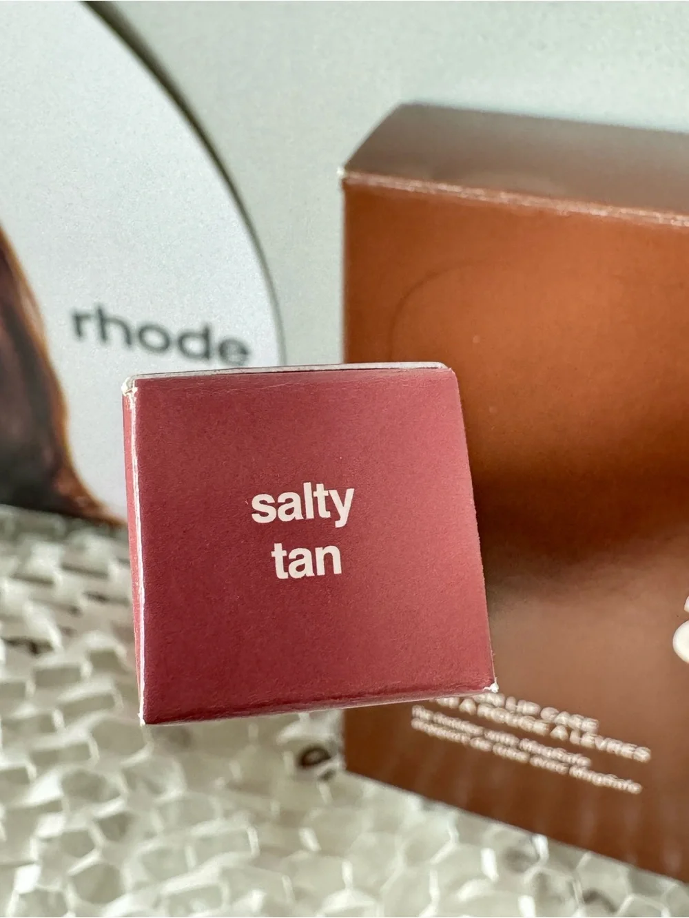 RHODE limited edition Snap-On Lip Case in Bronze + peptide lip tint in Salty tan